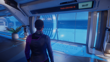 A video game screenshot of a character standing in a train station, looking at a sign that says 'Train Arriving in 0:30'