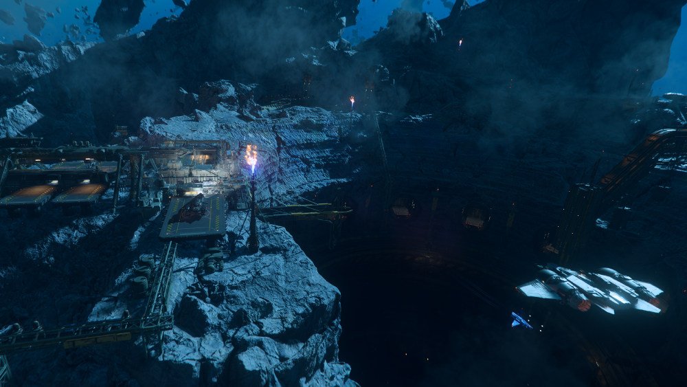 A screenshot from Star Citizen. Spaceships arrive and depart at the asteroid city of Levski.